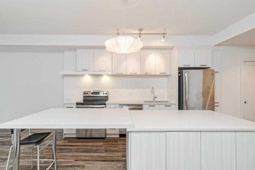 308-730 5 Street Ne, Calgary, AB - Indoor Photo Showing Kitchen With Stainless Steel Kitchen With Upgraded Kitchen