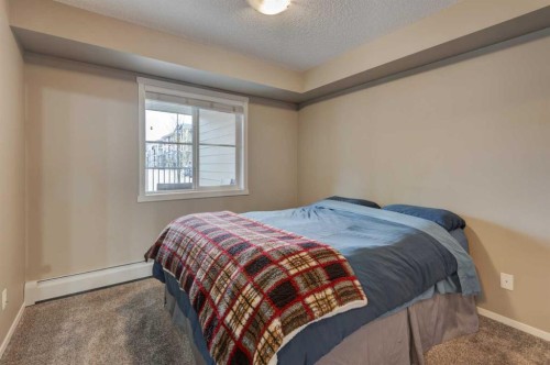 2125-81 Legacy Boulevard Se, Calgary, AB - Indoor Photo Showing Bedroom