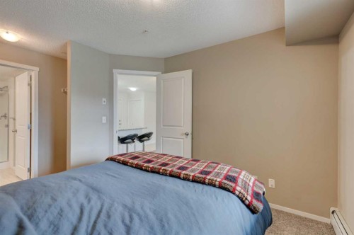 2125-81 Legacy Boulevard Se, Calgary, AB - Indoor Photo Showing Bedroom