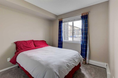 2125-81 Legacy Boulevard Se, Calgary, AB - Indoor Photo Showing Bedroom