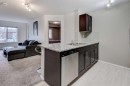 2125-81 Legacy Boulevard Se, Calgary, AB  - Indoor Photo Showing Kitchen With Double Sink 
