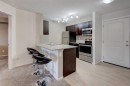 2125-81 Legacy Boulevard Se, Calgary, AB  - Indoor Photo Showing Kitchen With Double Sink 