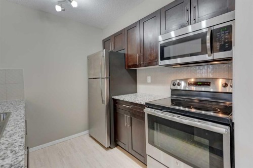 2125-81 Legacy Boulevard Se, Calgary, AB - Indoor Photo Showing Kitchen With Stainless Steel Kitchen