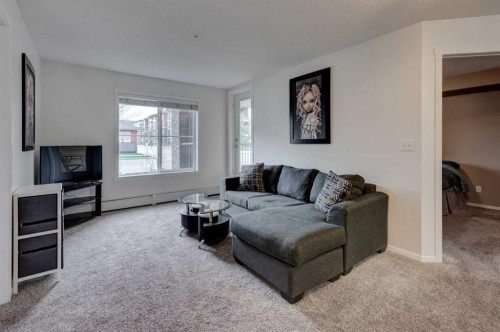2125-81 Legacy Boulevard Se, Calgary, AB - Indoor Photo Showing Living Room