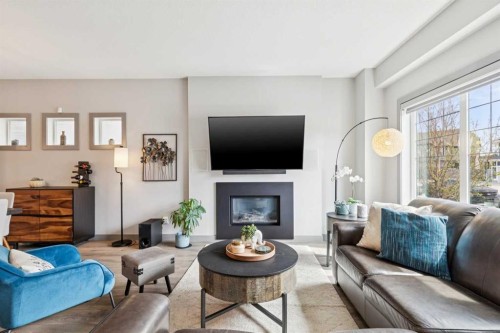 216 Mahogany Grove Se, Calgary, AB - Indoor Photo Showing Living Room With Fireplace