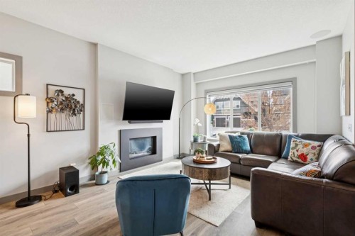216 Mahogany Grove Se, Calgary, AB - Indoor Photo Showing Living Room With Fireplace