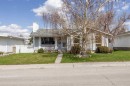 7720 Hunterquay Road Nw, Calgary, AB  - Outdoor With Facade 