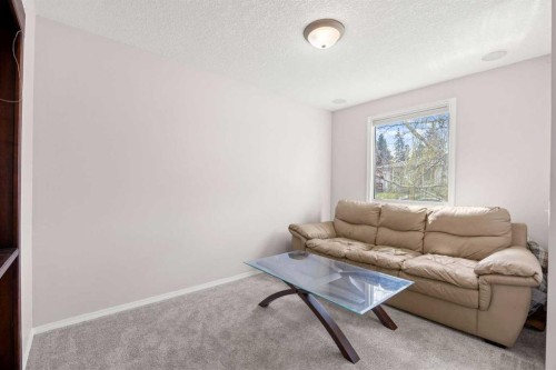 7720 Hunterquay Road Nw, Calgary, AB - Indoor Photo Showing Living Room