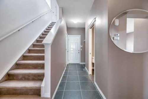 151 Everhollow Way Sw, Calgary, AB - Indoor Photo Showing Other Room