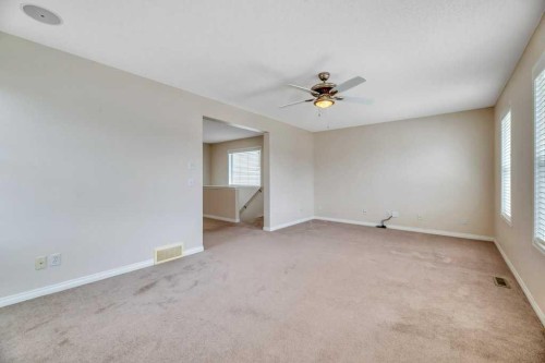 151 Everhollow Way Sw, Calgary, AB - Indoor Photo Showing Other Room