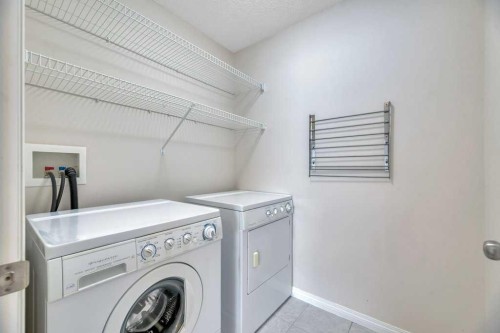 151 Everhollow Way Sw, Calgary, AB - Indoor Photo Showing Laundry Room