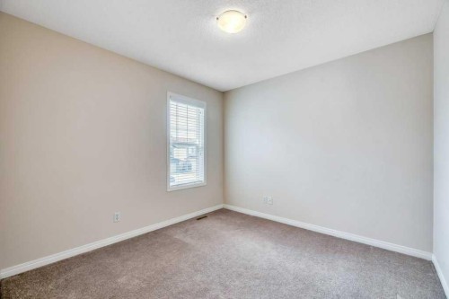 151 Everhollow Way Sw, Calgary, AB - Indoor Photo Showing Other Room