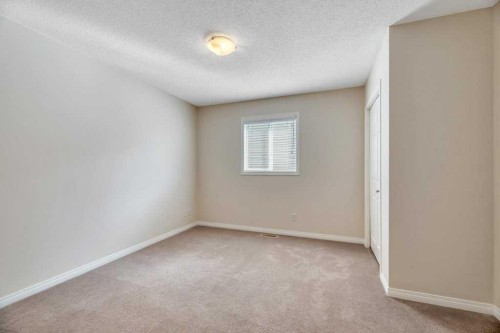 151 Everhollow Way Sw, Calgary, AB - Indoor Photo Showing Other Room