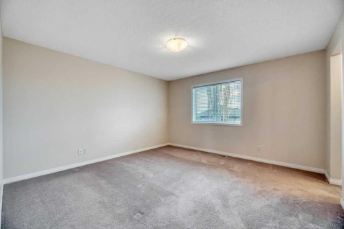 151 Everhollow Way Sw, Calgary, AB - Indoor Photo Showing Other Room