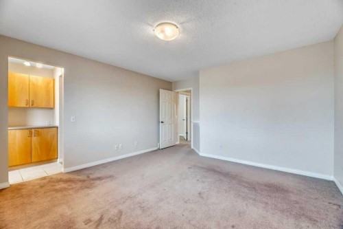 151 Everhollow Way Sw, Calgary, AB - Indoor Photo Showing Other Room