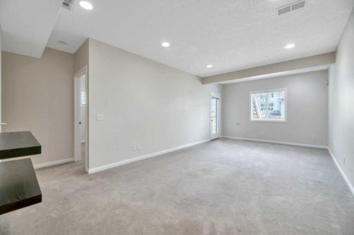 151 Everhollow Way Sw, Calgary, AB - Indoor Photo Showing Other Room