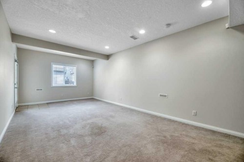 151 Everhollow Way Sw, Calgary, AB - Indoor Photo Showing Other Room