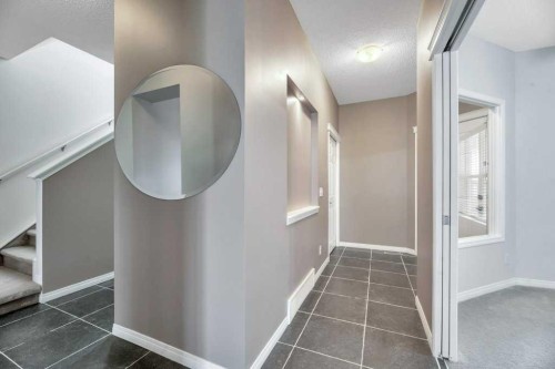 151 Everhollow Way Sw, Calgary, AB - Indoor Photo Showing Other Room