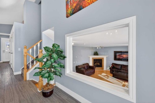 308 Cambridge Place, Strathmore, AB - Indoor Photo Showing Other Room With Fireplace