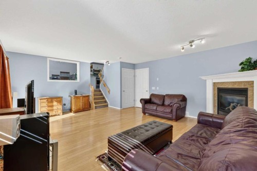 308 Cambridge Place, Strathmore, AB - Indoor Photo Showing Living Room With Fireplace