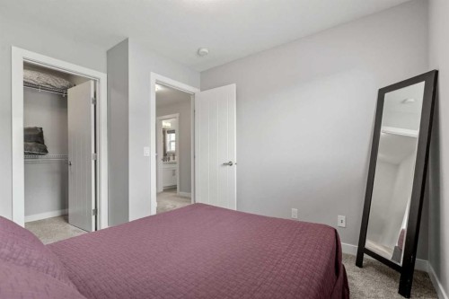 11 Masters Manor Se, Calgary, AB - Indoor Photo Showing Bedroom