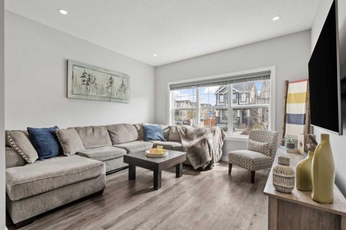 11 Masters Manor Se, Calgary, AB - Indoor Photo Showing Living Room