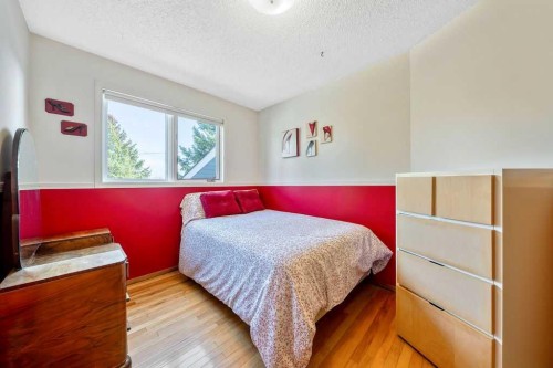 5019 Norris Road Nw, Calgary, AB - Indoor Photo Showing Bedroom