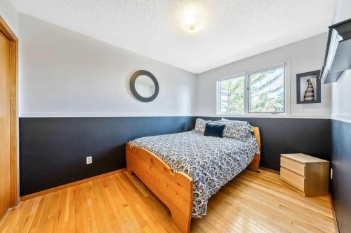 5019 Norris Road Nw, Calgary, AB - Indoor Photo Showing Bedroom