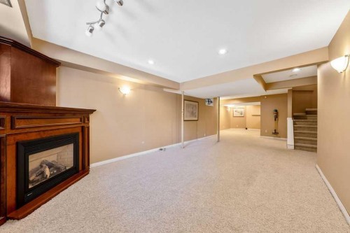 5019 Norris Road Nw, Calgary, AB - Indoor With Fireplace