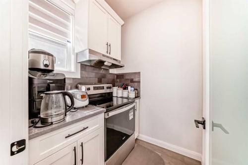 219 Chelsea Park, Chestermere, AB - Indoor Photo Showing Kitchen