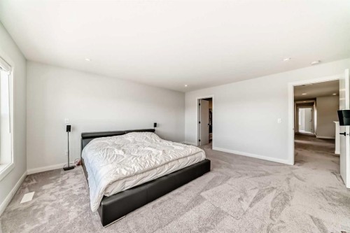 219 Chelsea Park, Chestermere, AB - Indoor Photo Showing Bedroom