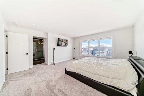 219 Chelsea Park, Chestermere, AB - Indoor Photo Showing Bedroom