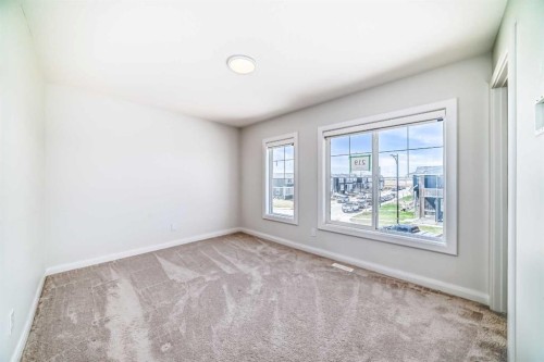 219 Chelsea Park, Chestermere, AB - Indoor Photo Showing Other Room