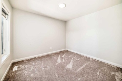 219 Chelsea Park, Chestermere, AB - Indoor Photo Showing Other Room