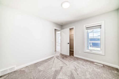 219 Chelsea Park, Chestermere, AB - Indoor Photo Showing Other Room