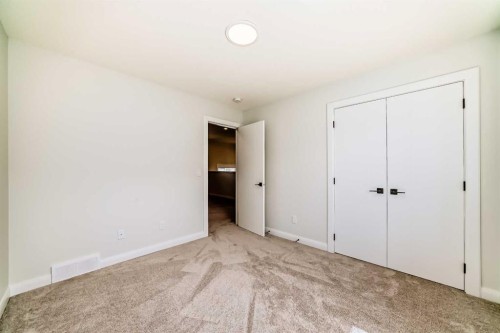 219 Chelsea Park, Chestermere, AB - Indoor Photo Showing Other Room