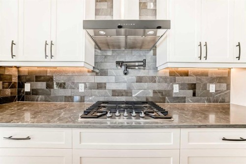 219 Chelsea Park, Chestermere, AB - Indoor Photo Showing Kitchen
