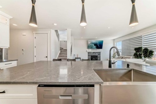 219 Chelsea Park, Chestermere, AB - Indoor Photo Showing Kitchen With Upgraded Kitchen