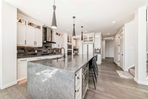 219 Chelsea Park, Chestermere, AB - Indoor Photo Showing Kitchen With Upgraded Kitchen