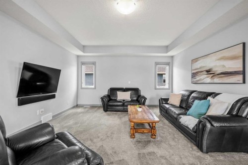 229 Stonemere Bay, Chestermere, AB - Indoor Photo Showing Living Room