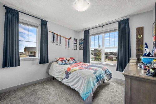 229 Stonemere Bay, Chestermere, AB - Indoor Photo Showing Bedroom