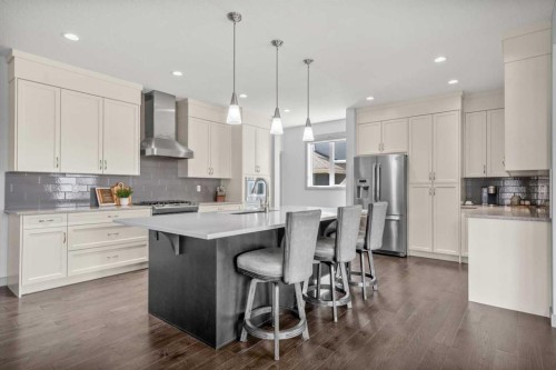 229 Stonemere Bay, Chestermere, AB - Indoor Photo Showing Kitchen With Upgraded Kitchen