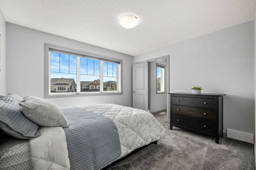 229 Stonemere Bay, Chestermere, AB - Indoor Photo Showing Bedroom