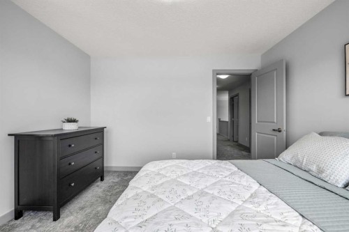 229 Stonemere Bay, Chestermere, AB - Indoor Photo Showing Bedroom
