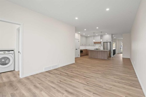 123 5 Avenue Se, High River, AB - Indoor Photo Showing Laundry Room