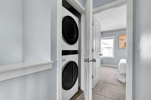 359 Silverado Common Sw, Calgary, AB - Indoor Photo Showing Laundry Room