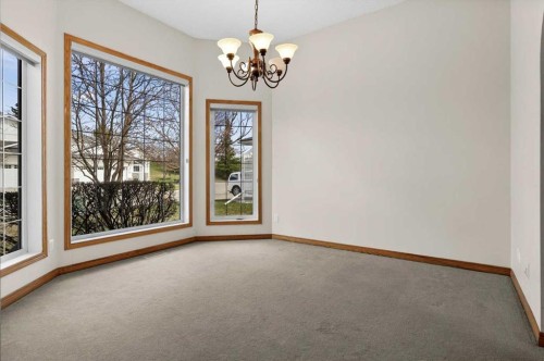 122 Rocky Ridge Villas Nw, Calgary, AB - Indoor Photo Showing Other Room