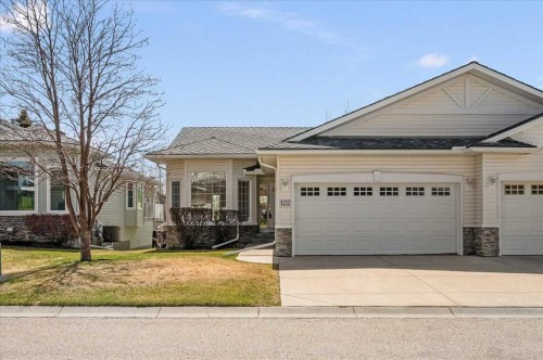 122 Rocky Ridge Villas Nw, Calgary, AB - Outdoor
