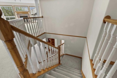 122 Rocky Ridge Villas Nw, Calgary, AB - Indoor Photo Showing Other Room