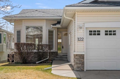 122 Rocky Ridge Villas Nw, Calgary, AB - Outdoor